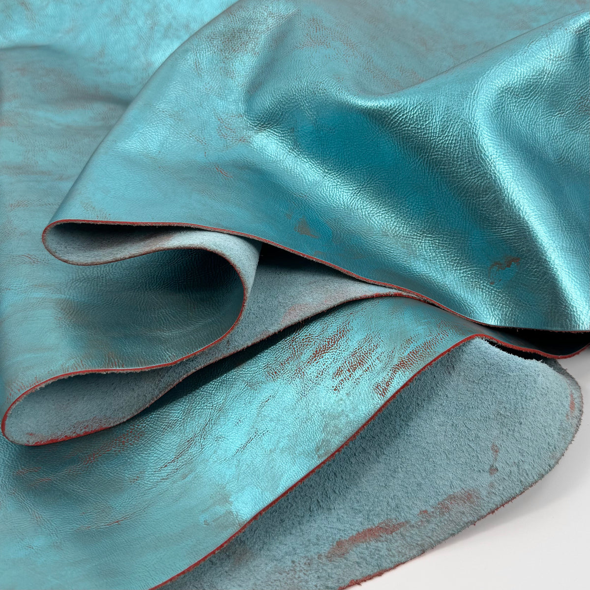 Midas Teal/Rust Distressed Metallic Cow