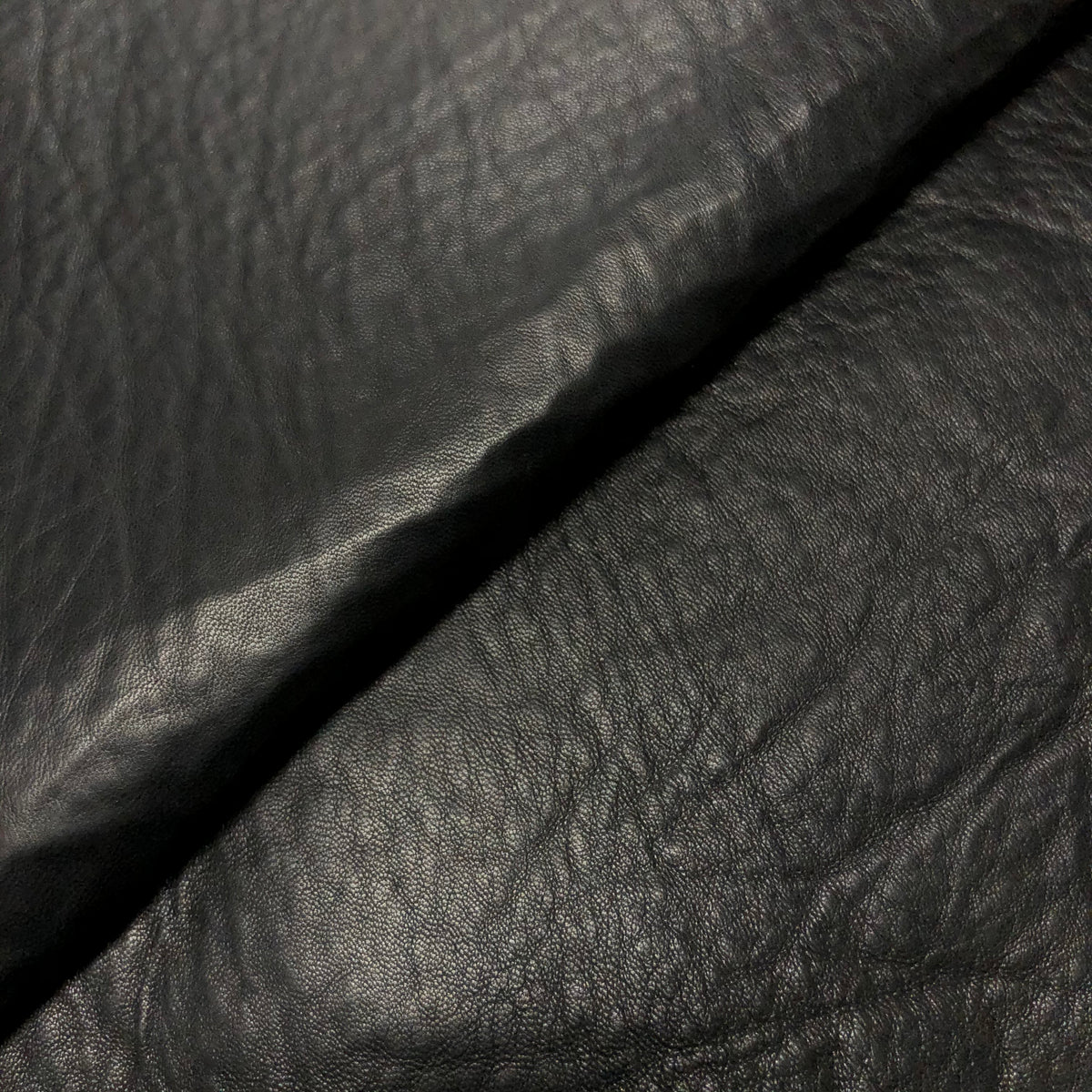 Black Puffer Lamb with Contrasting Backing