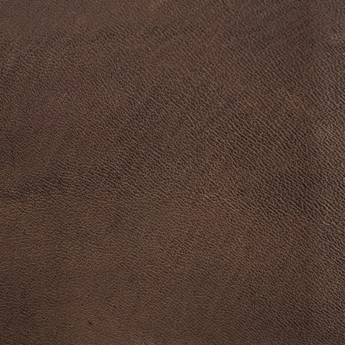 Wild Thing Nubuck Horse Leather in Makassar – exotic dark-toned leather designed to patina with elegance, from District Leathers.
