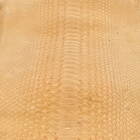 Premium dried peach Nubuck Python skin with a velvety matte finish and natural patterning.